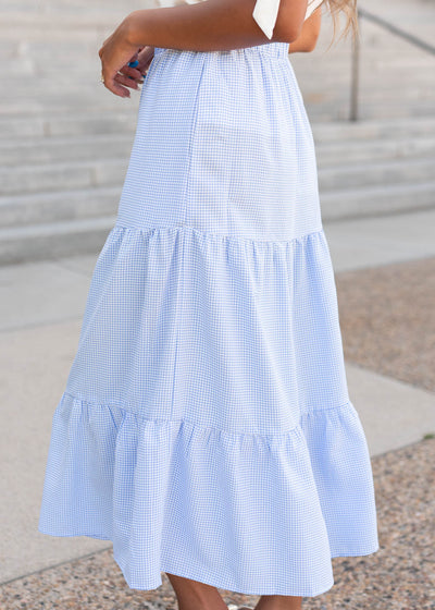 Side view of the sky blue gingham skirt