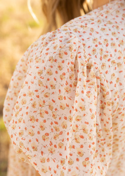 Ivory floral top sleeve
