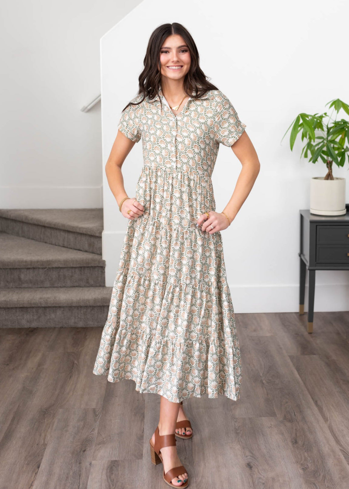 Green floral collared dress with tiered skirt and button up bodice