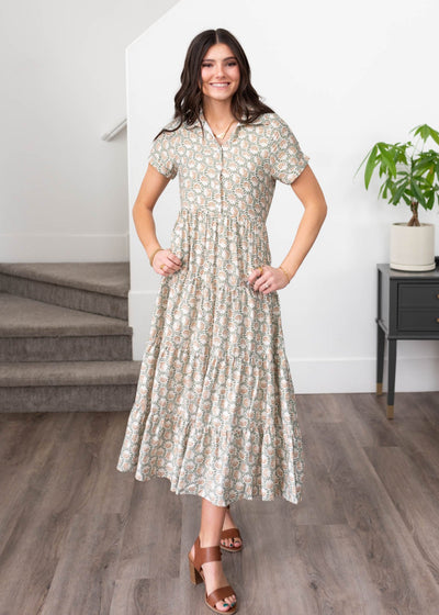 Green floral collared dress with tiered skirt and button up bodice