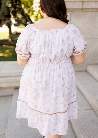 Back view of the plus size natural floral dress in plus size