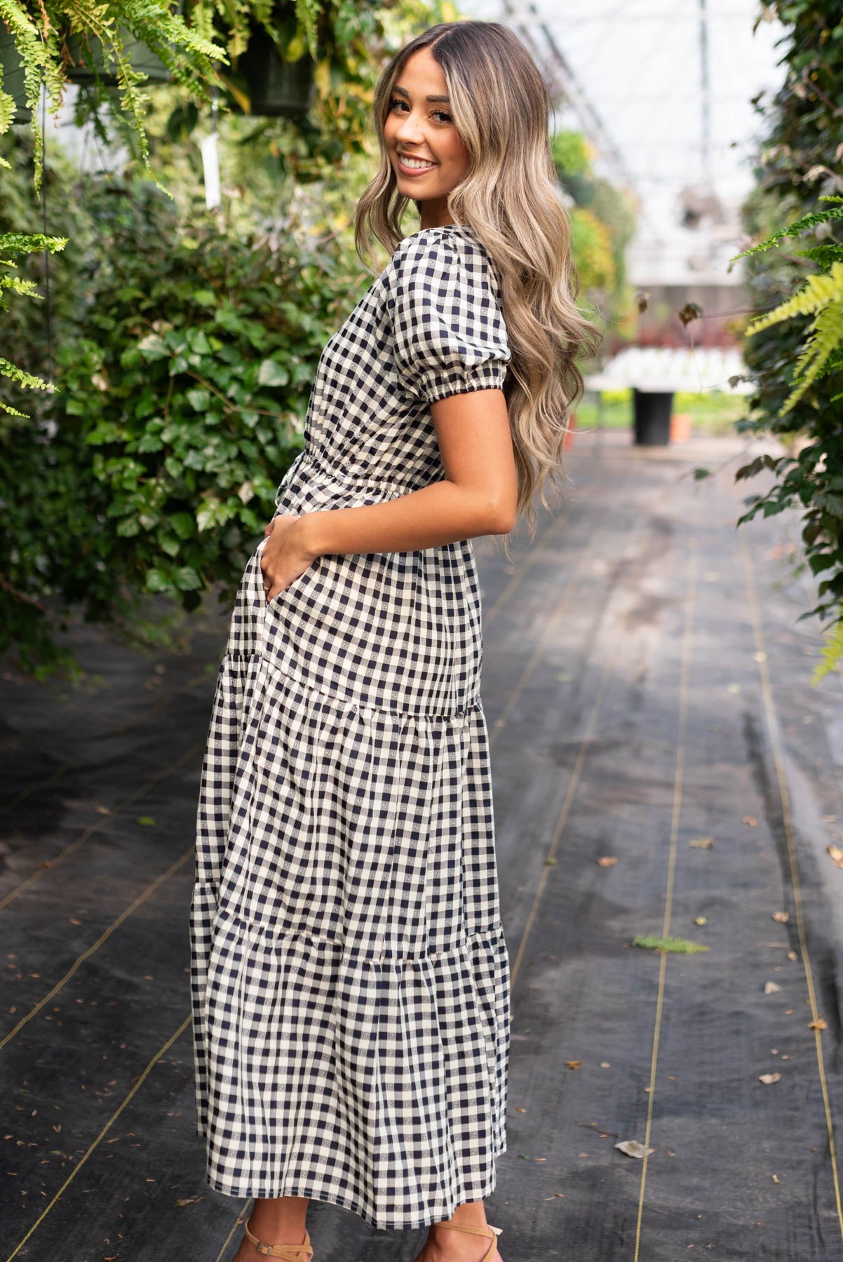 Side view of the navy tiered dress