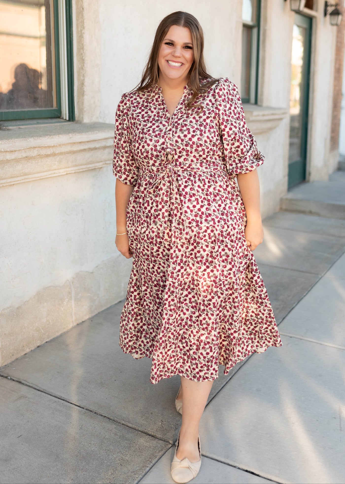 Modest burgundy floral dress with a tie at the waist