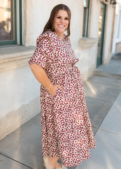 Side view of the burundy floral dress in plus size with pockets