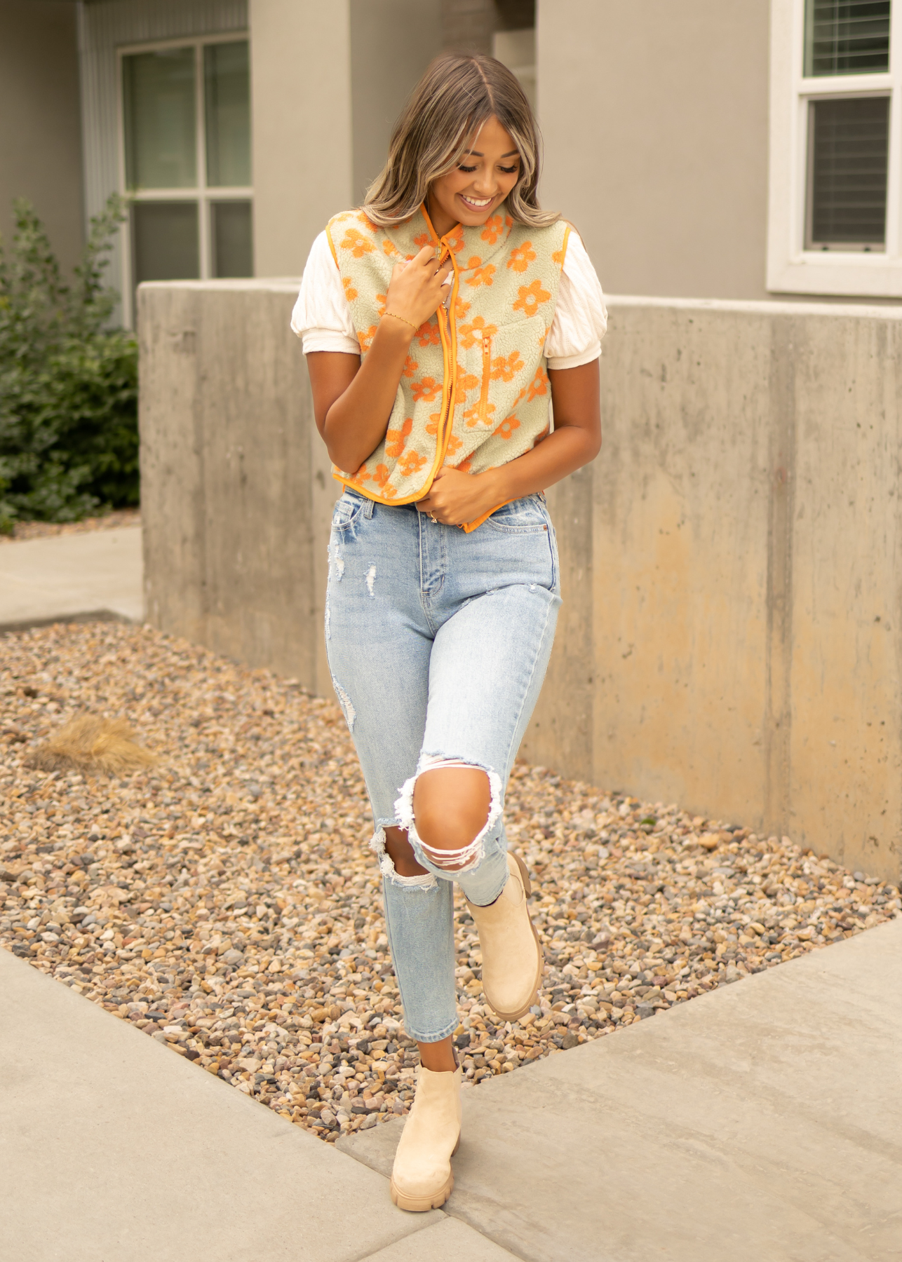Orange fleece vest that zips up