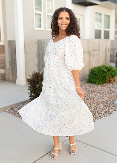 Tiered skirt on the ivory floral dress