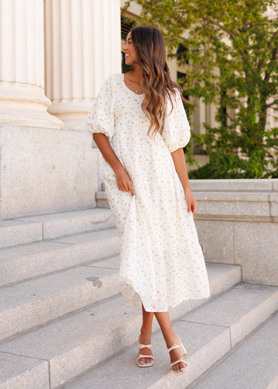 Ivory floral dress with a wide v-neck