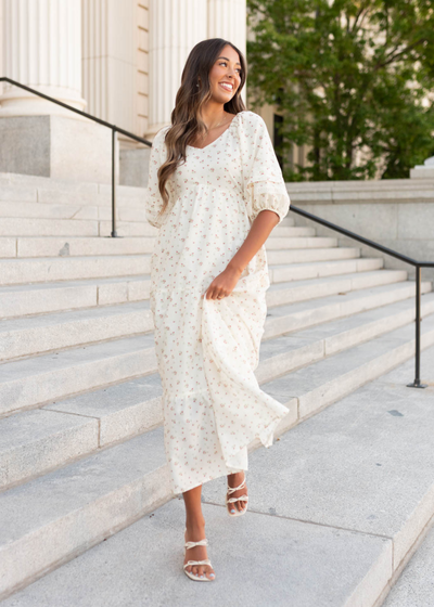 Ivory floral dress with a wide v-neck