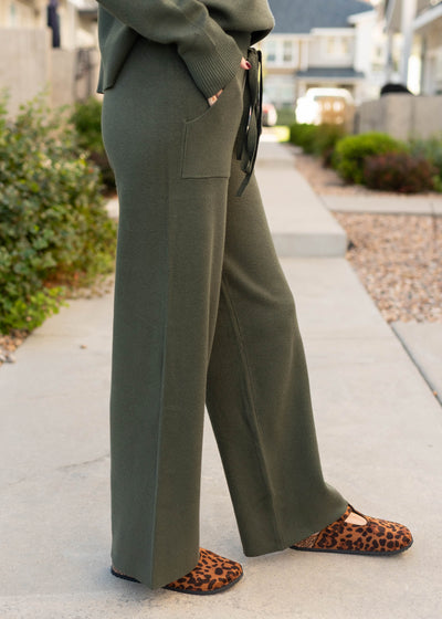 Side view of the forest green pants