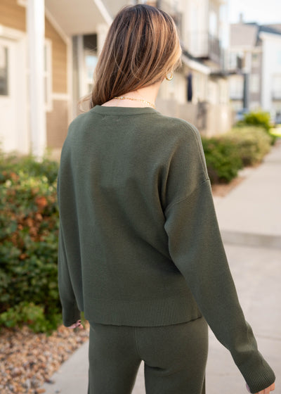 Back view of the forest green sweater