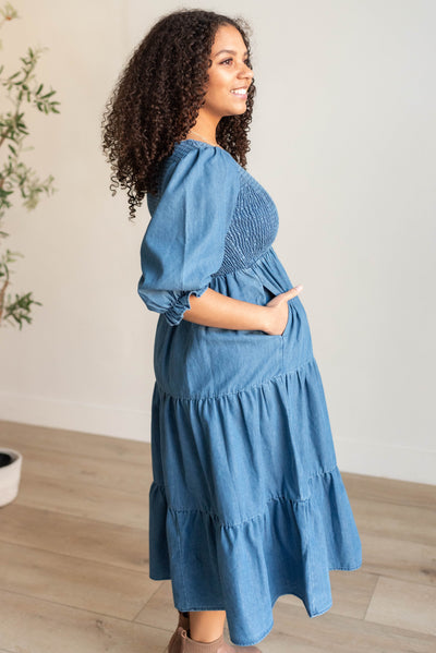 Side view of the vintage denim dress with pockets