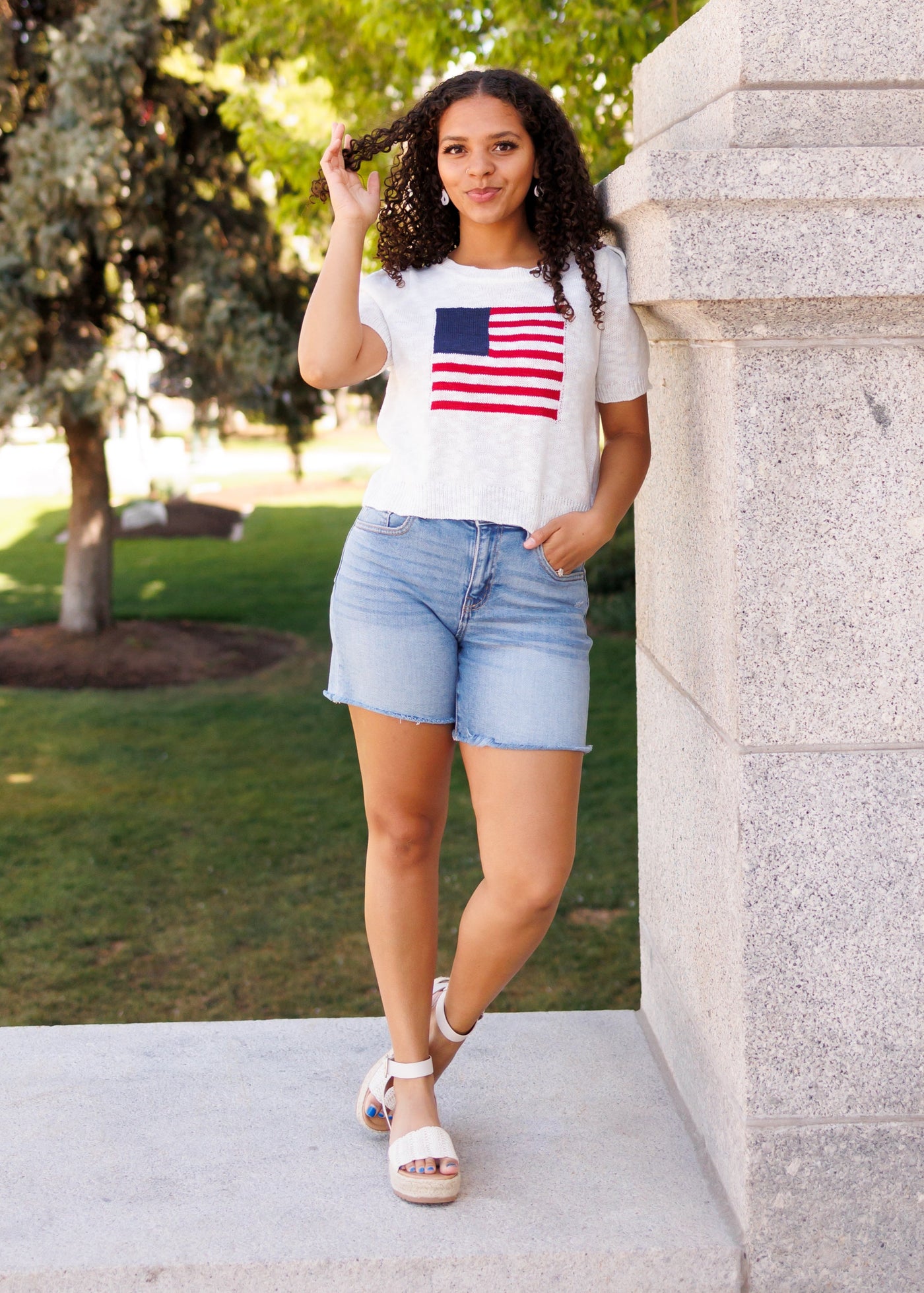 Ivory flag sweater top with short sleeves