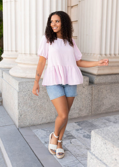 Pink peplum top in size small