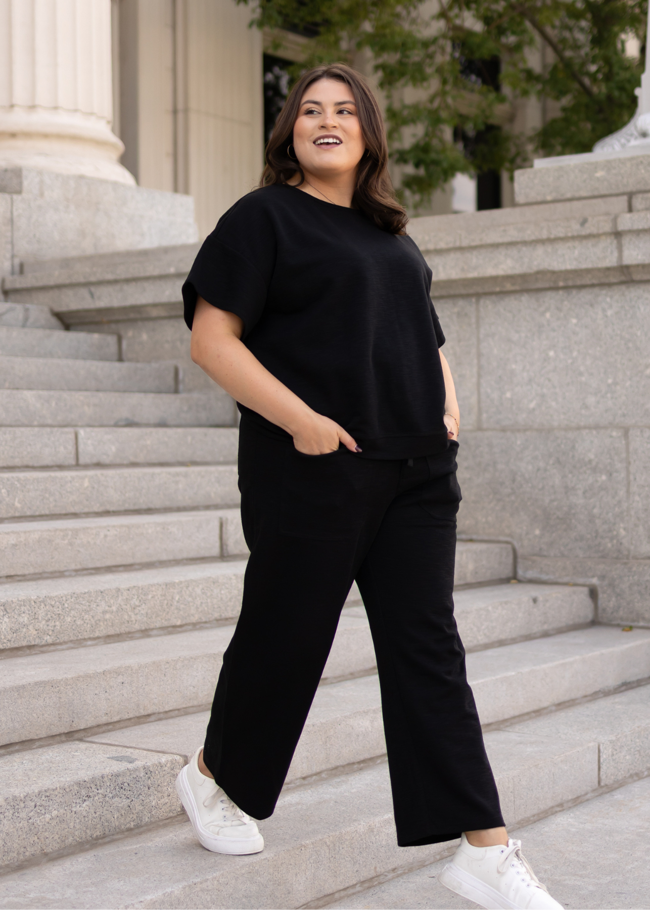 Short sleeve plus size black knit top by lena lou in size 1x to 3x