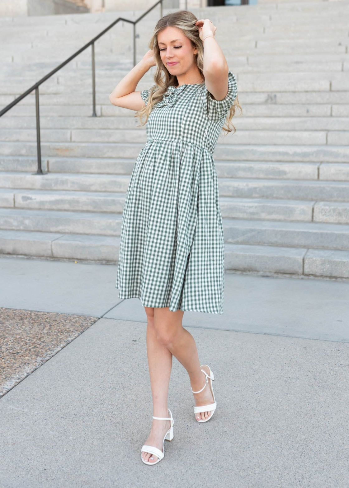 Small sage gingham bow dress that fall right above the knee.