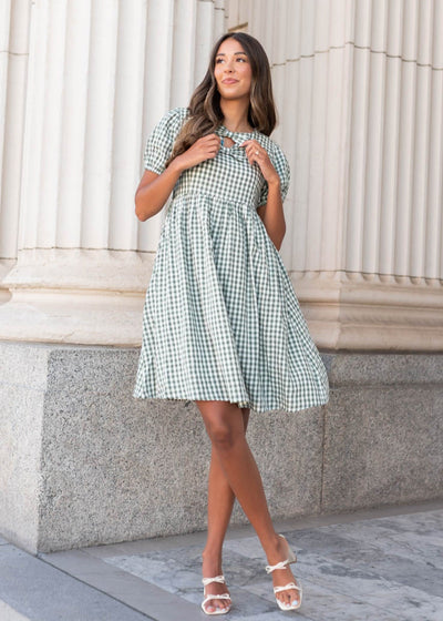 Above the knee sage gingham bow dress with bows at the neckline