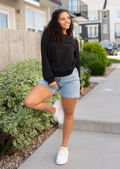 Black long sleeve top with cuffs