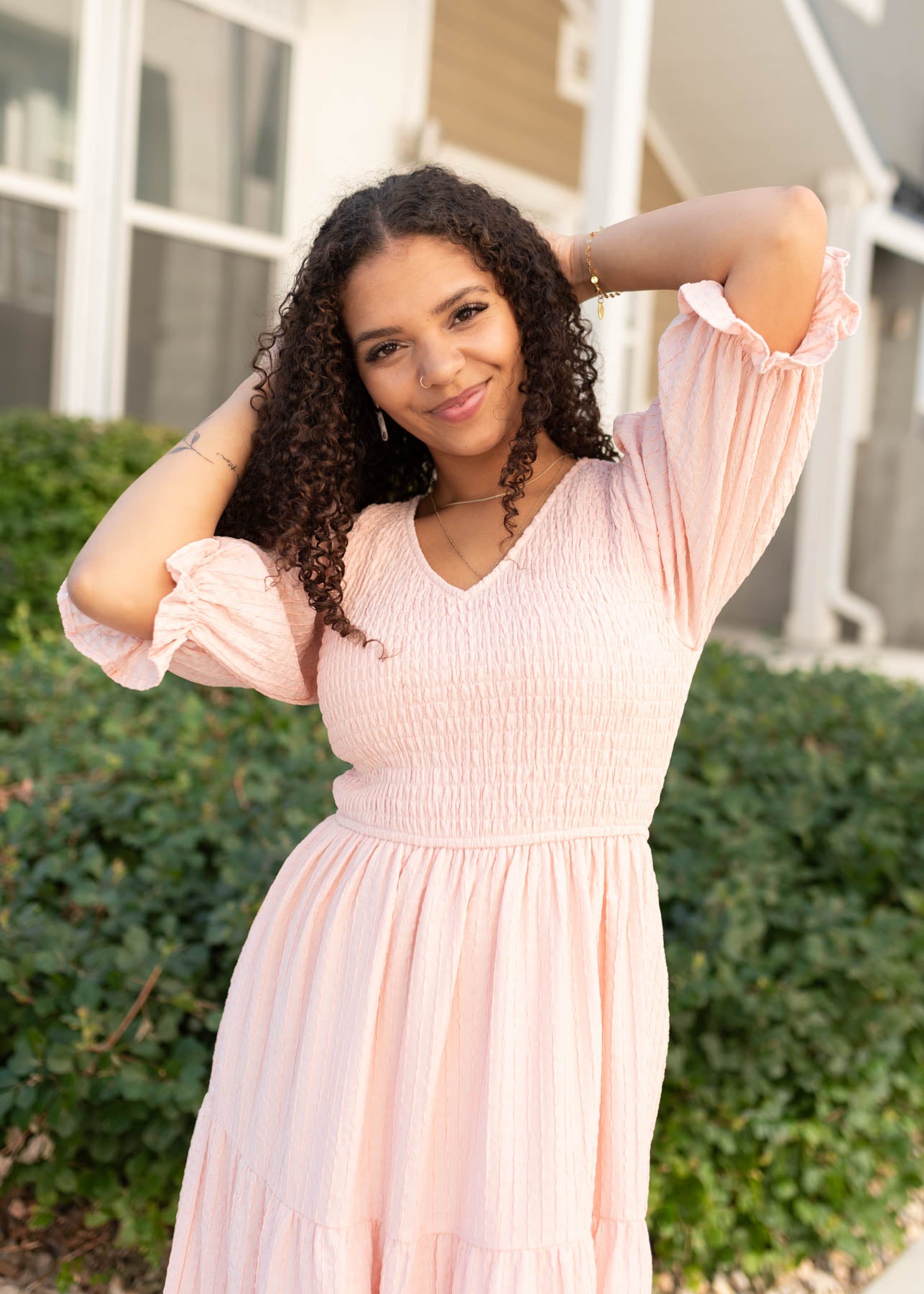 Lena & Lou blush smocked dress with short sleeves and v-neck