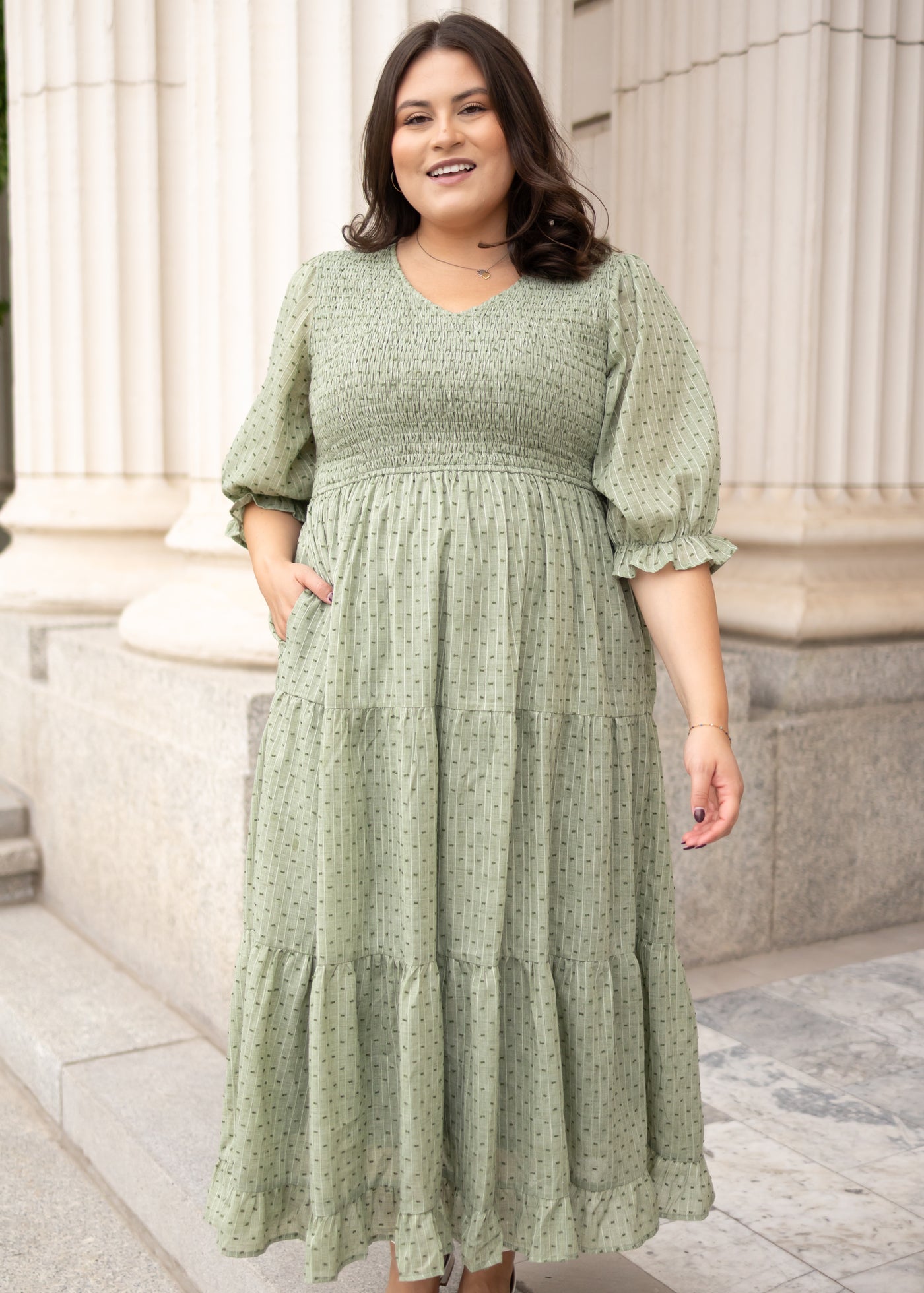 Short sleeve modest geen smocked dress with a vneck and tiered skirt sold at Lena Layne
