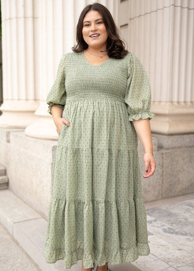 Short sleeve modest geen smocked dress with a vneck and tiered skirt sold at Lena Layne