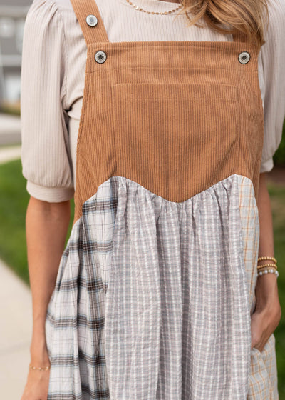 Close up of the caramel colored bodice on the patch work overall dress