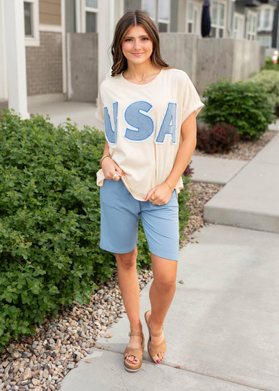 Light blue shorts in knit fabric