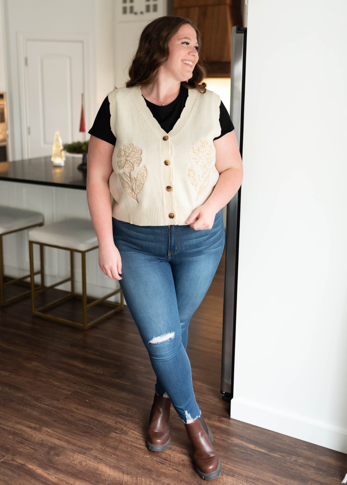 Flower patch sweater vest in plus size that buttons up