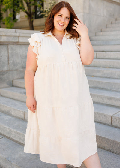 Plus size natural flutter sleeve dress with tiered skirt