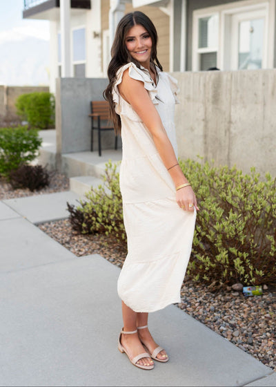 Sleeveless natural flutter sleeve dress