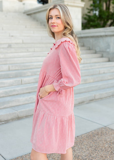 3/4 sleeves with bows on the red gingham dress