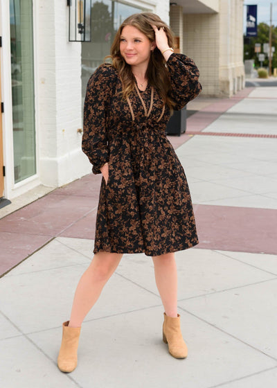 Knee length floral dress with long sleeves and pockets