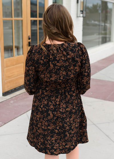 Back view of the short black floral dress