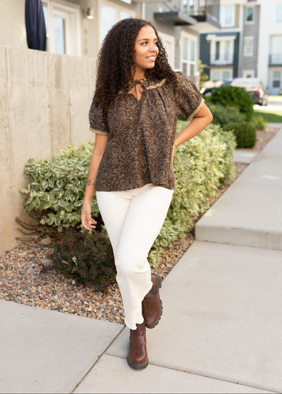 Short sleeve modest brown pattern top with gold trim
