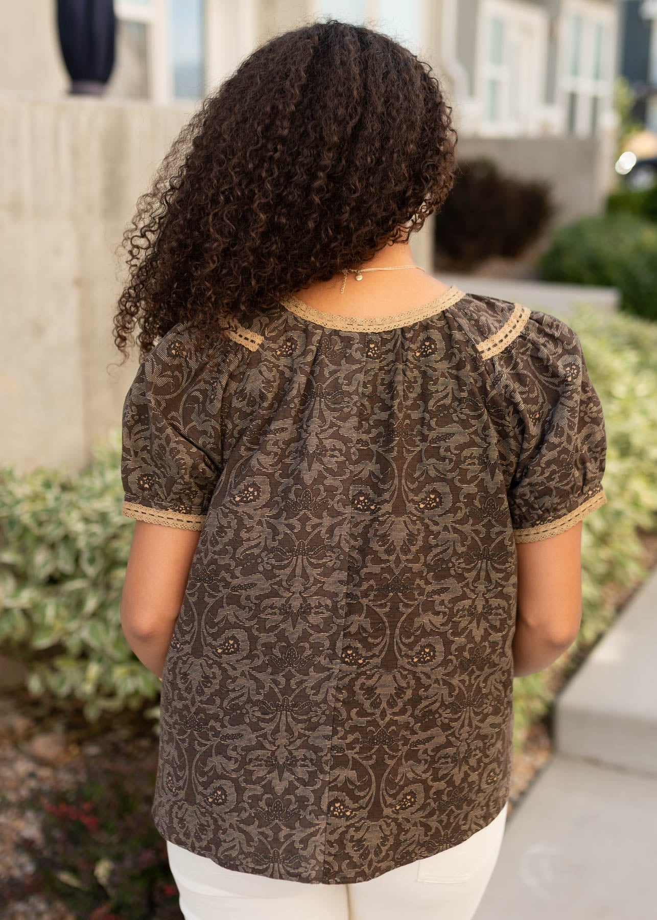 Back view of the brown pattern top