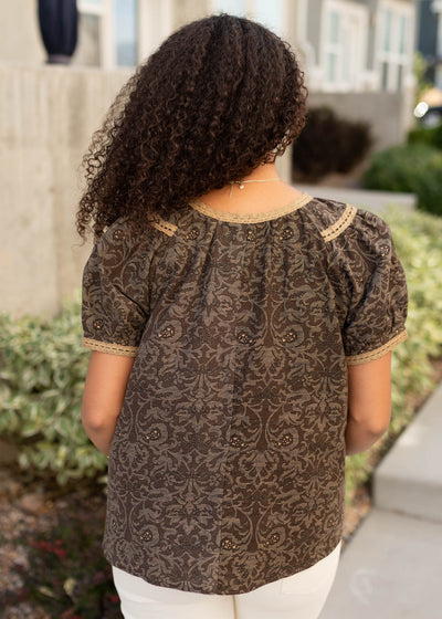 Back view of the brown pattern top