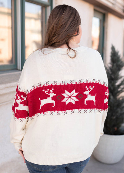 Back view of the Christmas cream patterned sweater in plus size