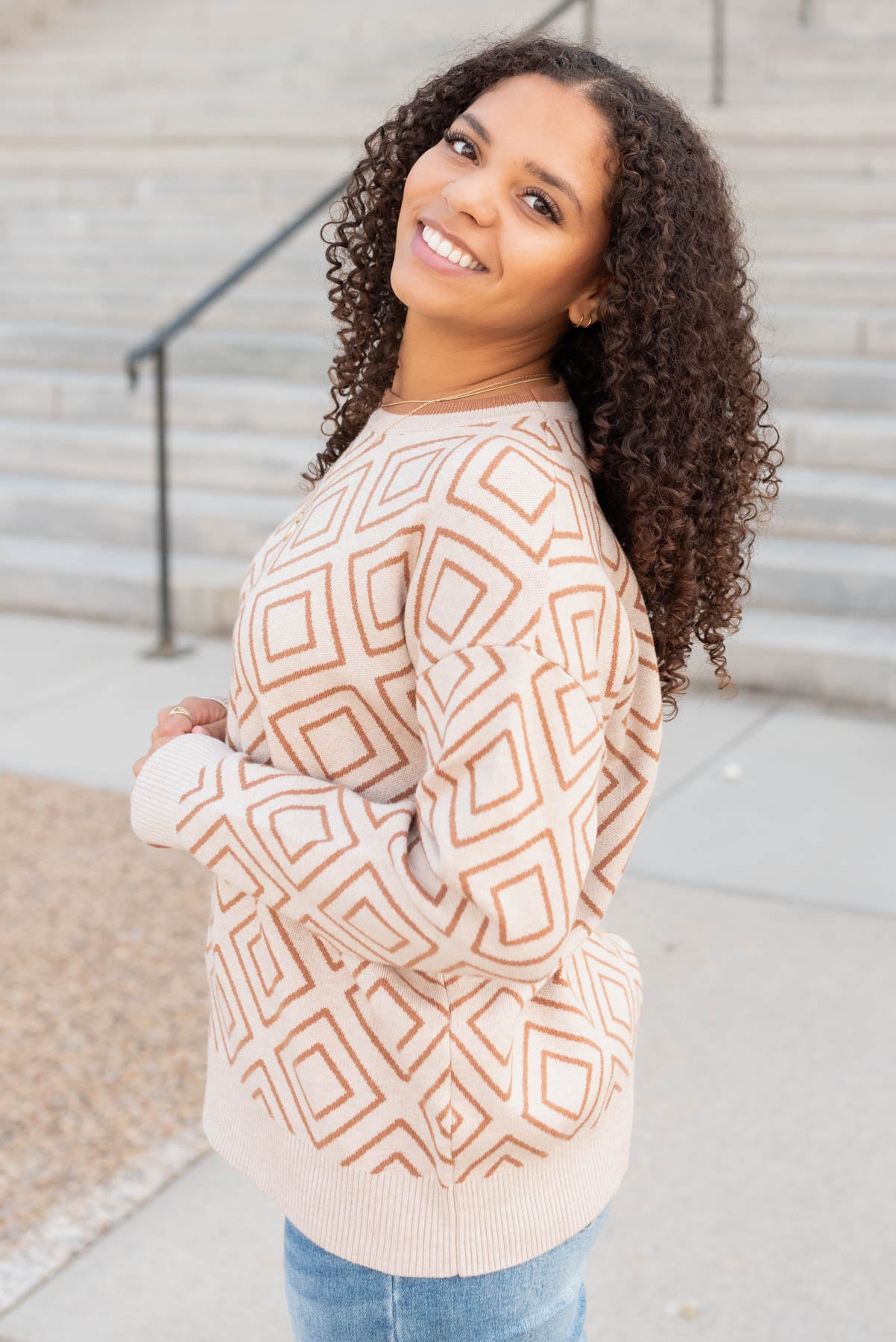Side view of the oatmeal patterm sweater