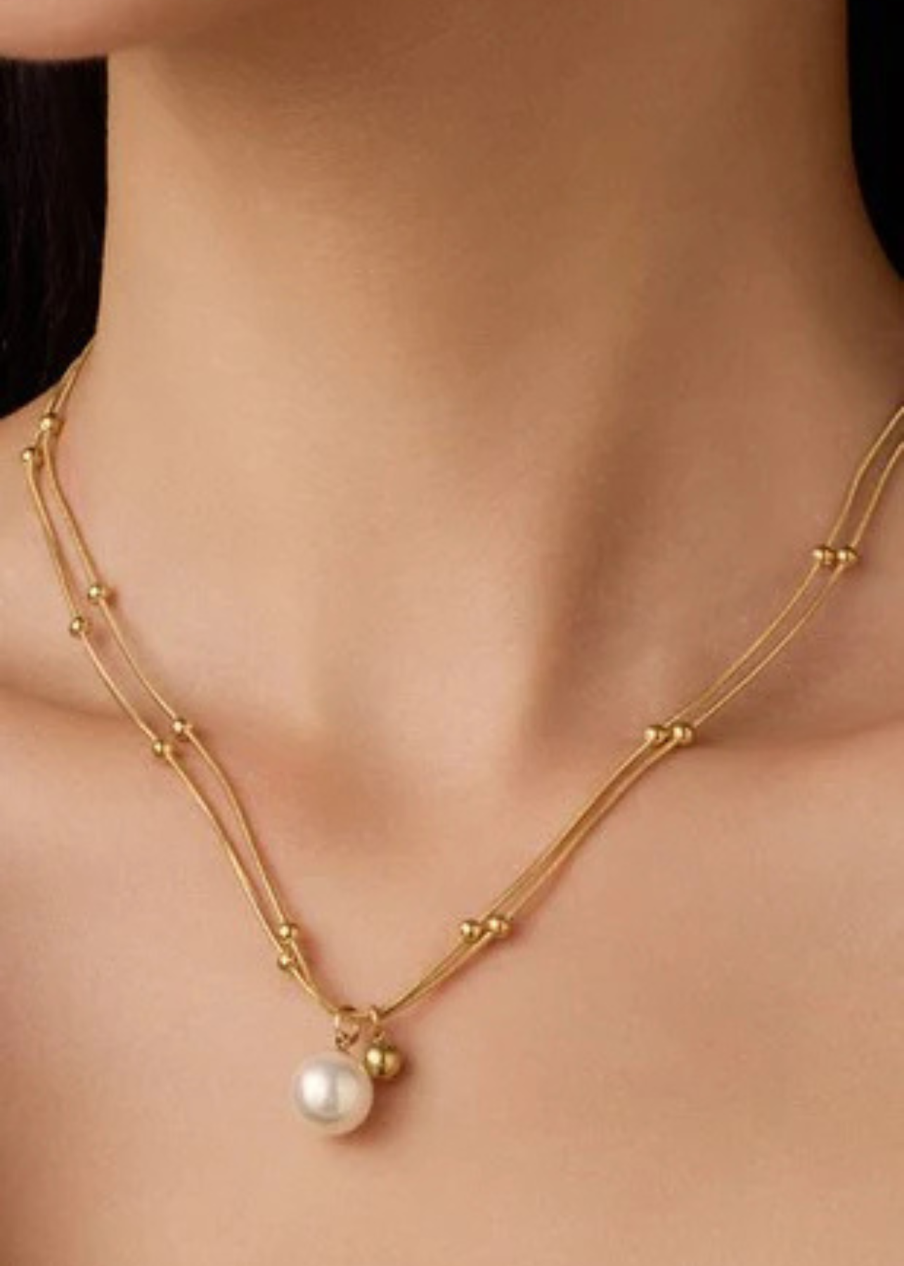 Gold pearl chain necklace