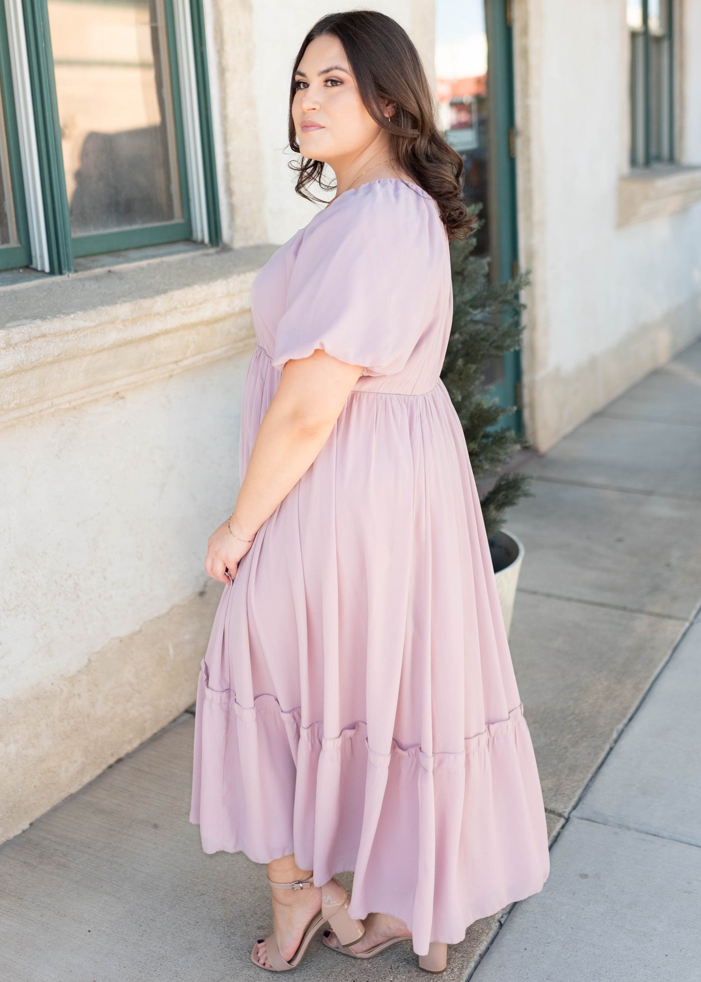 Side view of the lilac tiered dress in plus size