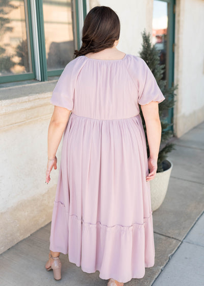 Back view of the lilac tiered dress in plus size