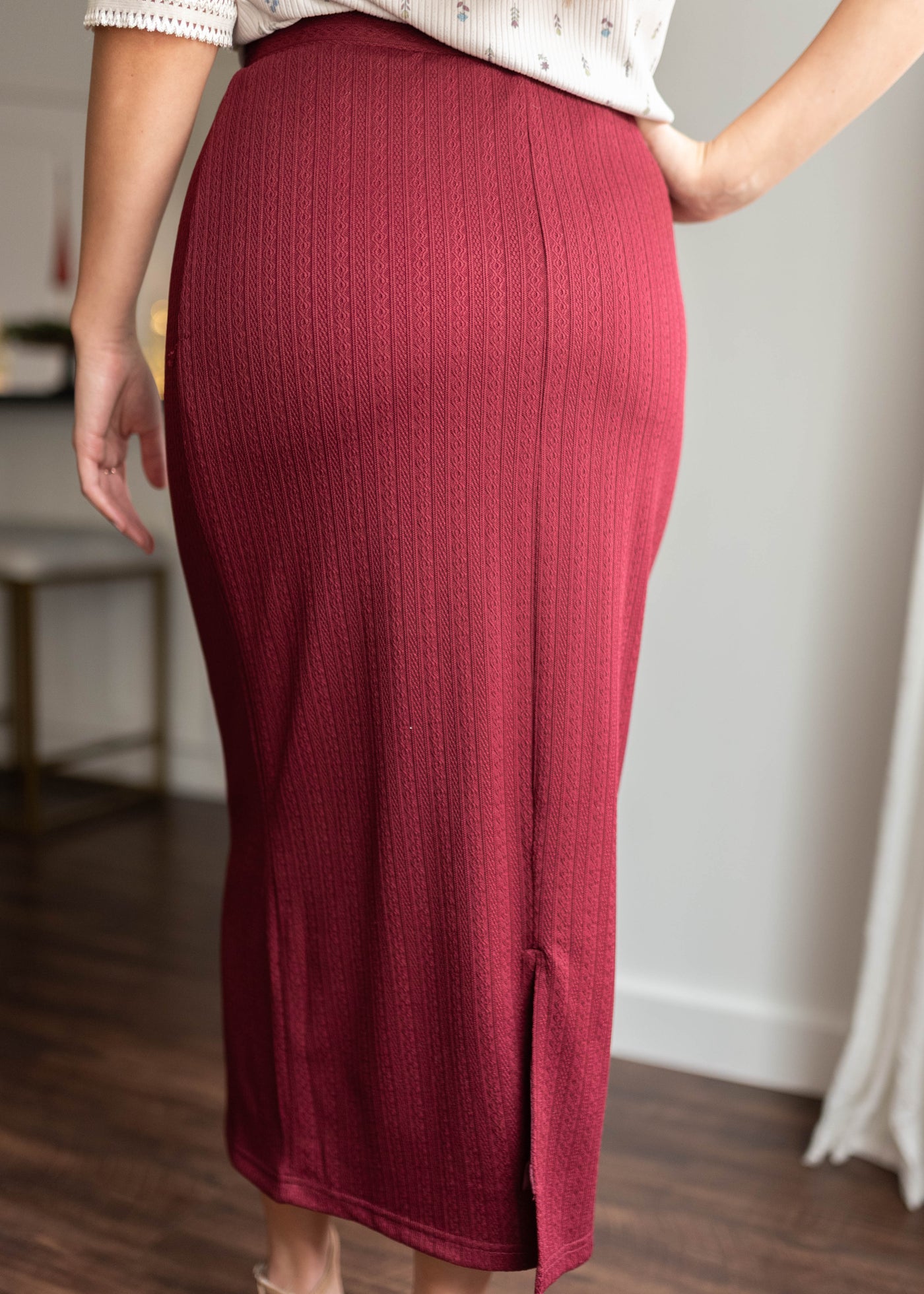 Back view of the burgundy midi skirt