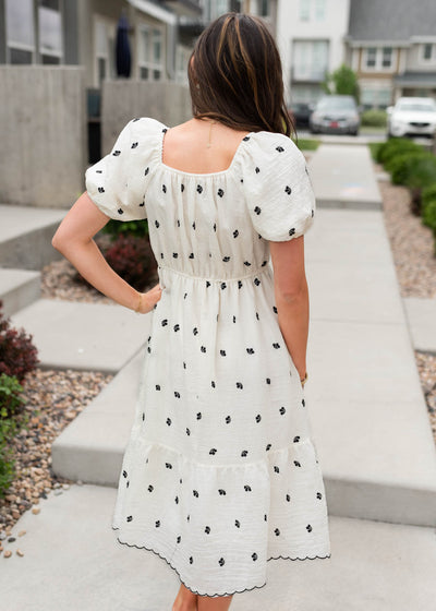 Back view of the ivory embroidered floral dress