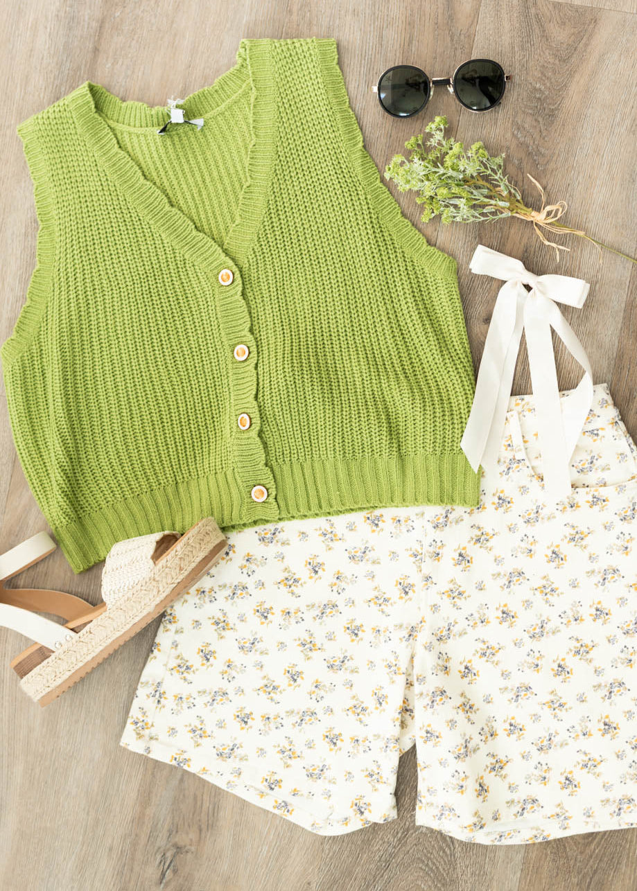 Light green button up vest