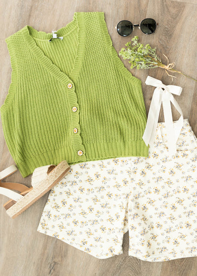 Light green button up vest