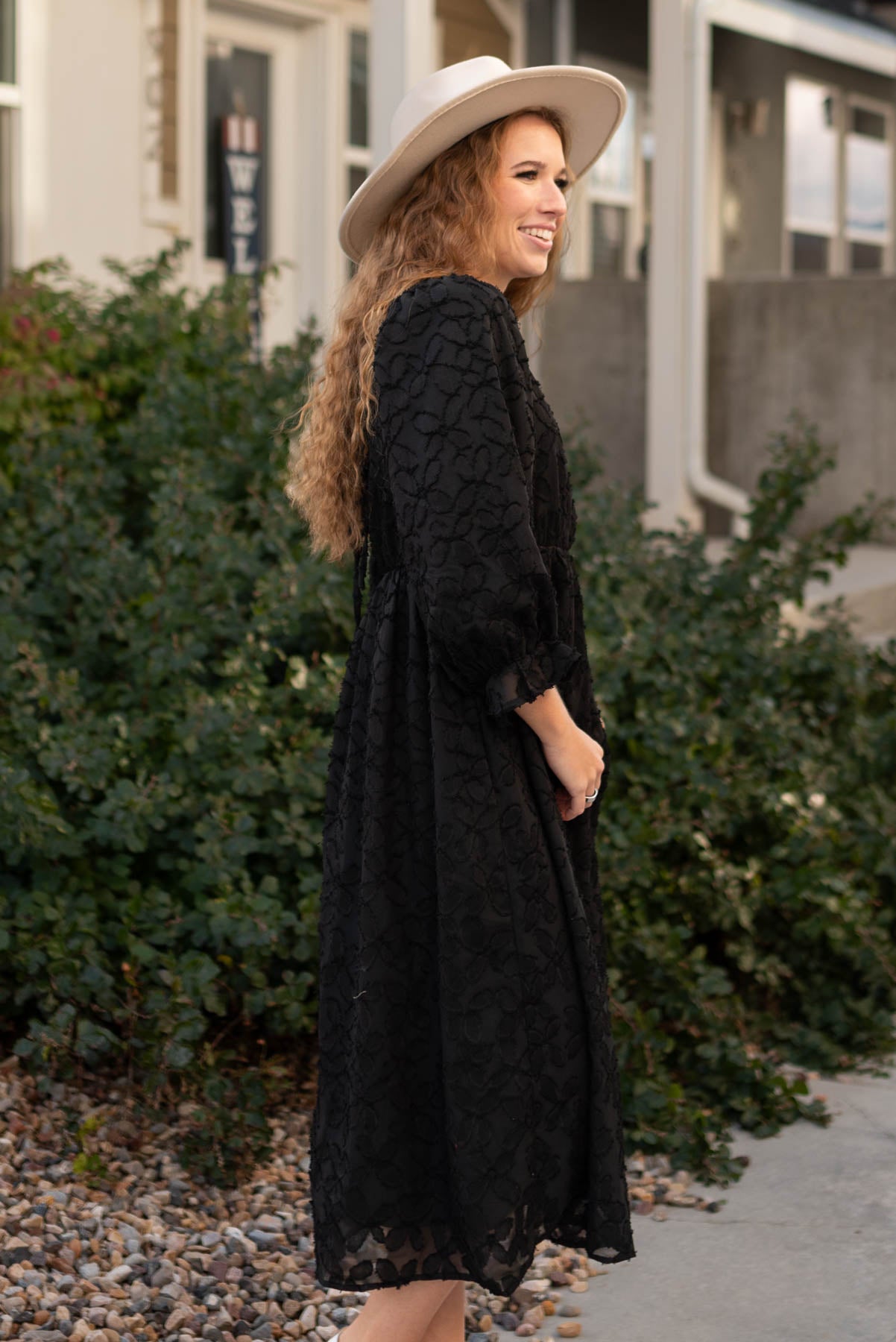 Side view of a black floral dress