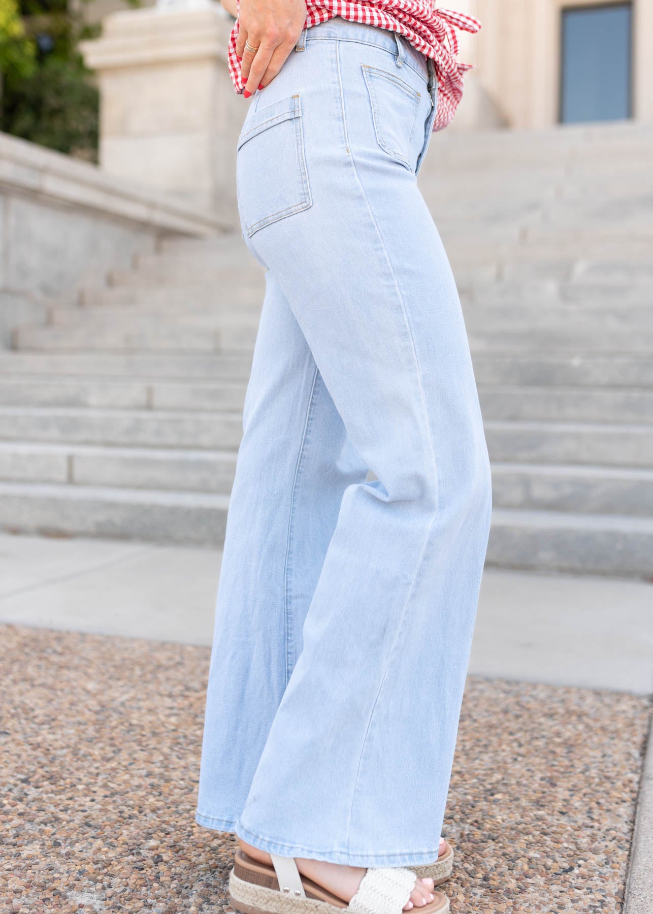 Side view of the light denim jeans