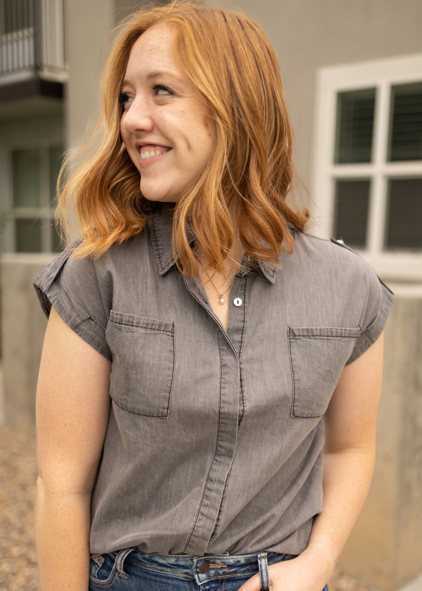 Button up light grey denim top with front pockets