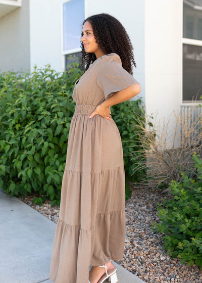 Side view of the pale brown tiered dress
