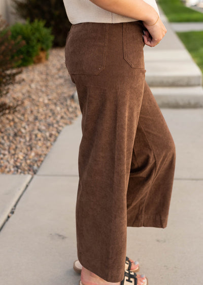 Side view of the brown corduroy pants