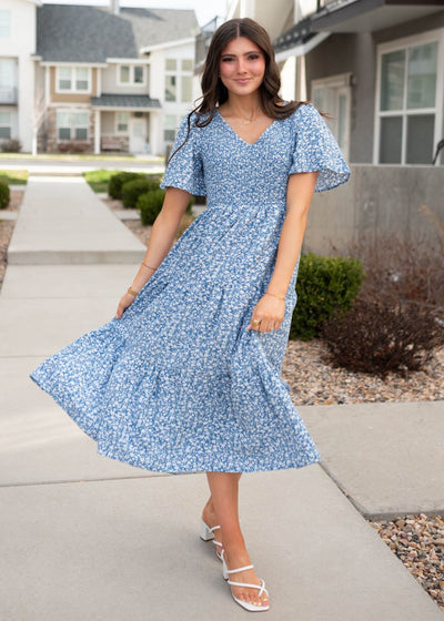Blue smocked floral dress with short sleeves